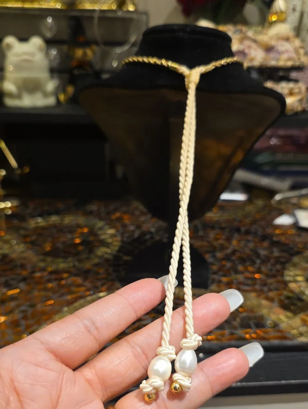 Gold Rope Necklace with Blue and White Charm Details